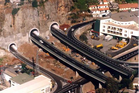 <div style="text-align:center; color:white;"><div style="font-size:17px; ">Bridge over Ribeira Brava</div><br>Client: SRESA (R.A. Madeira)<br>Year: 1994 – 1996</div>