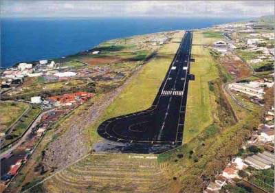 <div style="text-align:center; color:white;"><div style="font-size:17px; ">Aeroporto João Paulo II * (São Miguel, Açores)</div><br>Cliente: Dir. Geral de Aeronáutica Civil<br>Ano: 1965 – 1967</div>