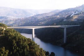 <div style="text-align:center; color:white;"><div style="font-size:17px; ">Bridge over the Douro River in Resende</div><br>Client: Município de Resende e de Baião<br>Year: 1996 – 1998</div>